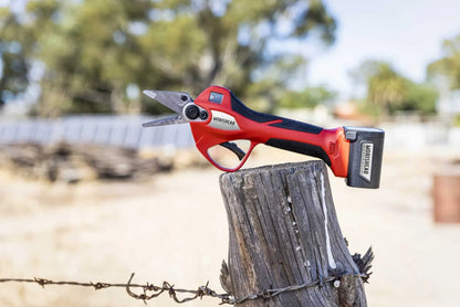 Mobishear 37mm hoof trimming secateur with Australian made foot paring blades attached on fence post with Australian farm background.